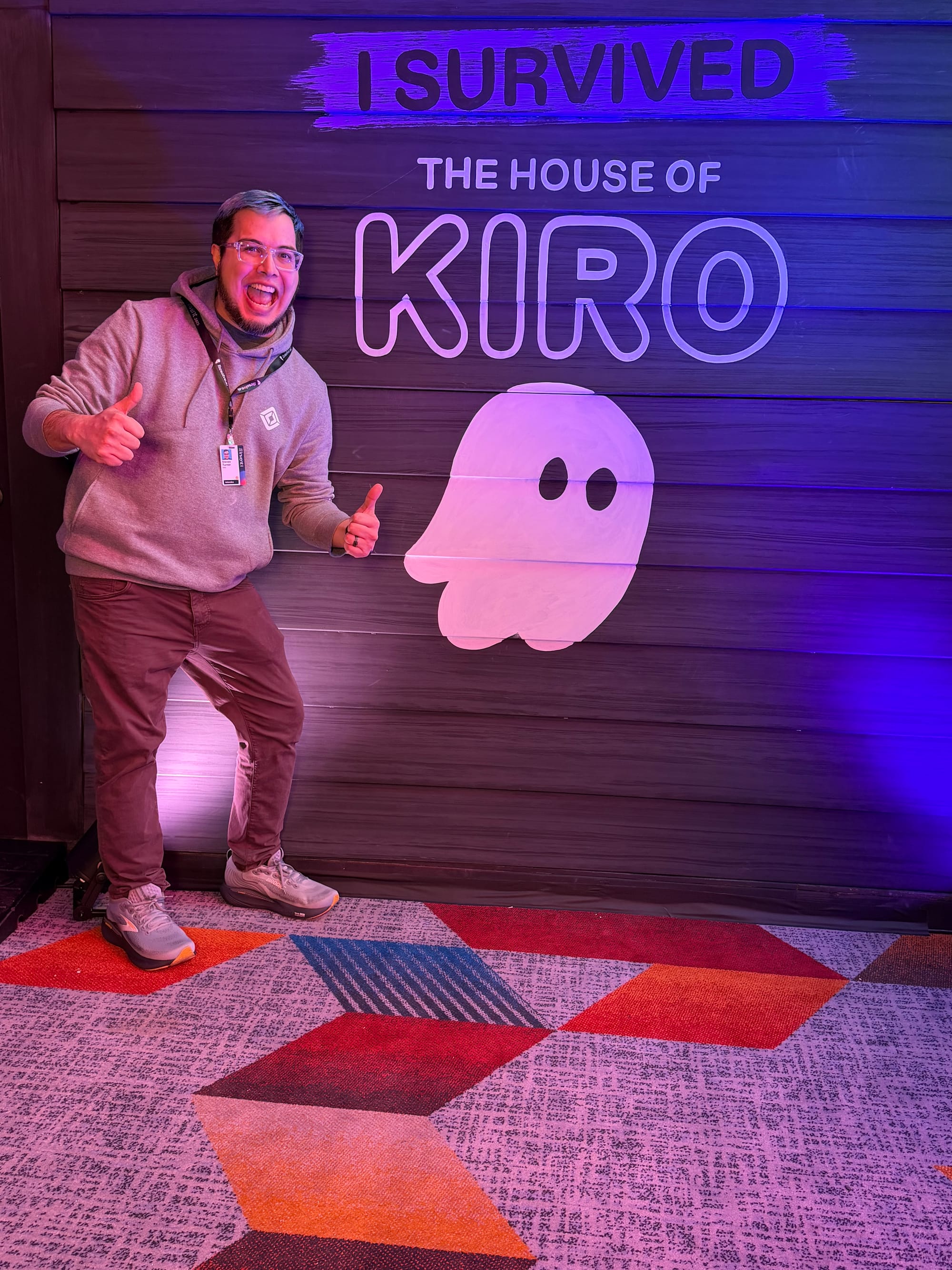 Picture of me in front of a sign showing the house of Kiro